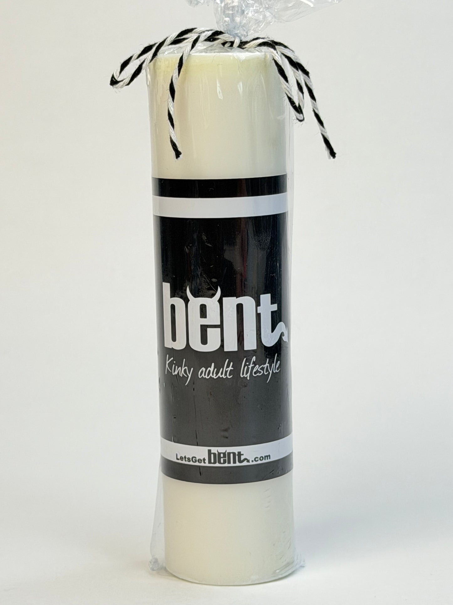 Handmade white paraffin wax play pillar candle by Bent in packaging