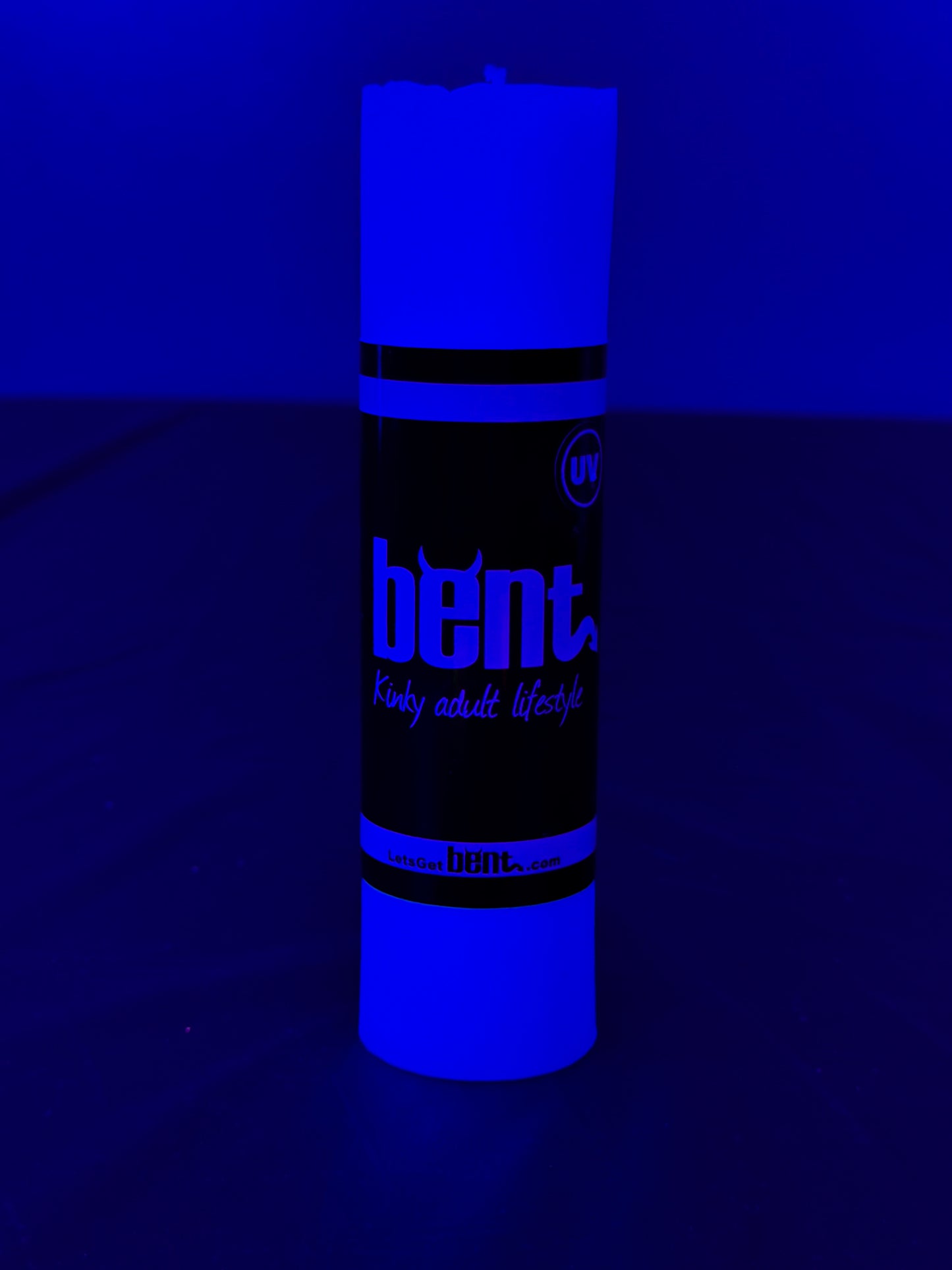 Bent UV Candle Under Blacklight