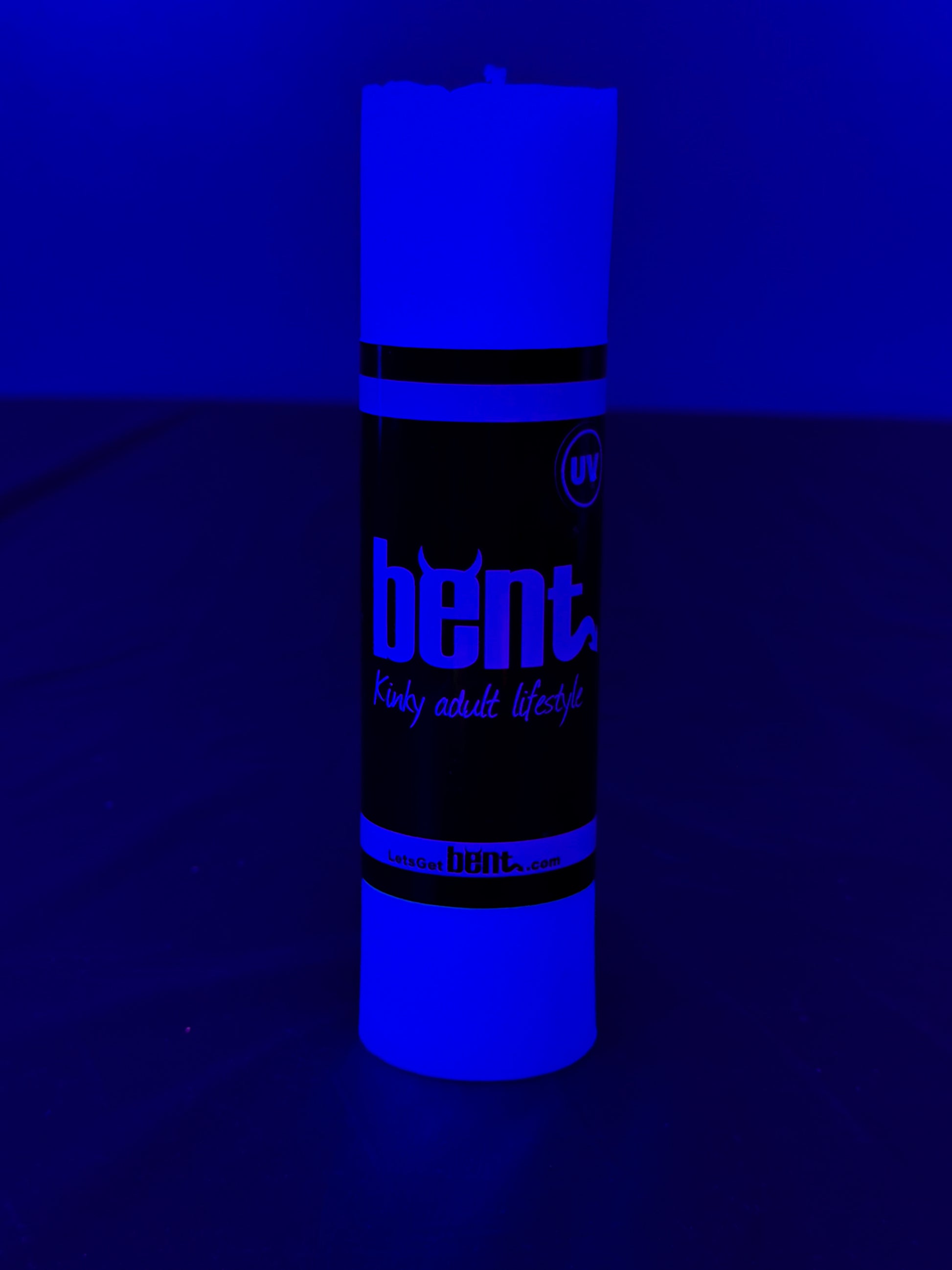 Bent UV Candle Under Blacklight