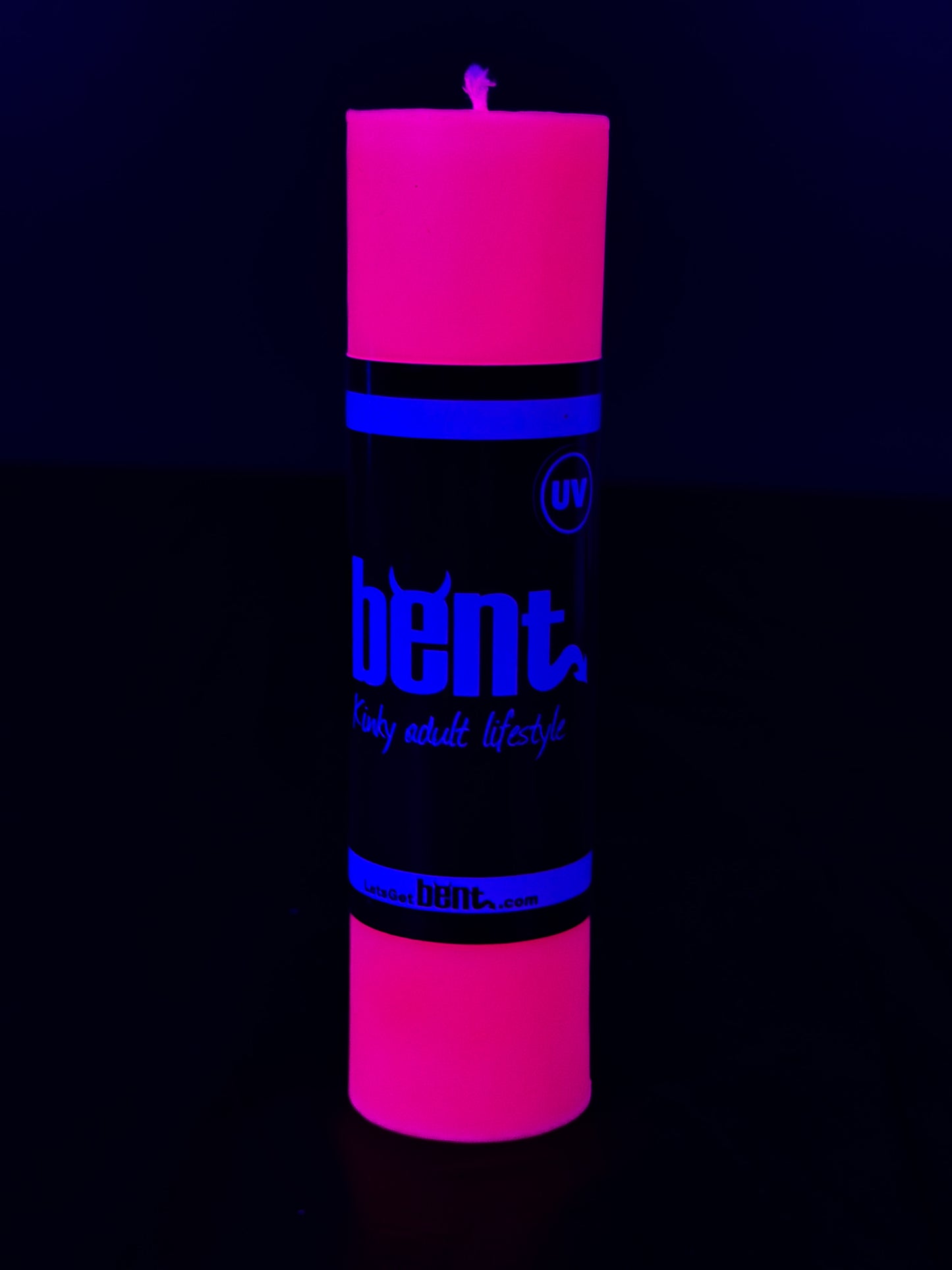 UV Pink Candle Glowing under blacklight