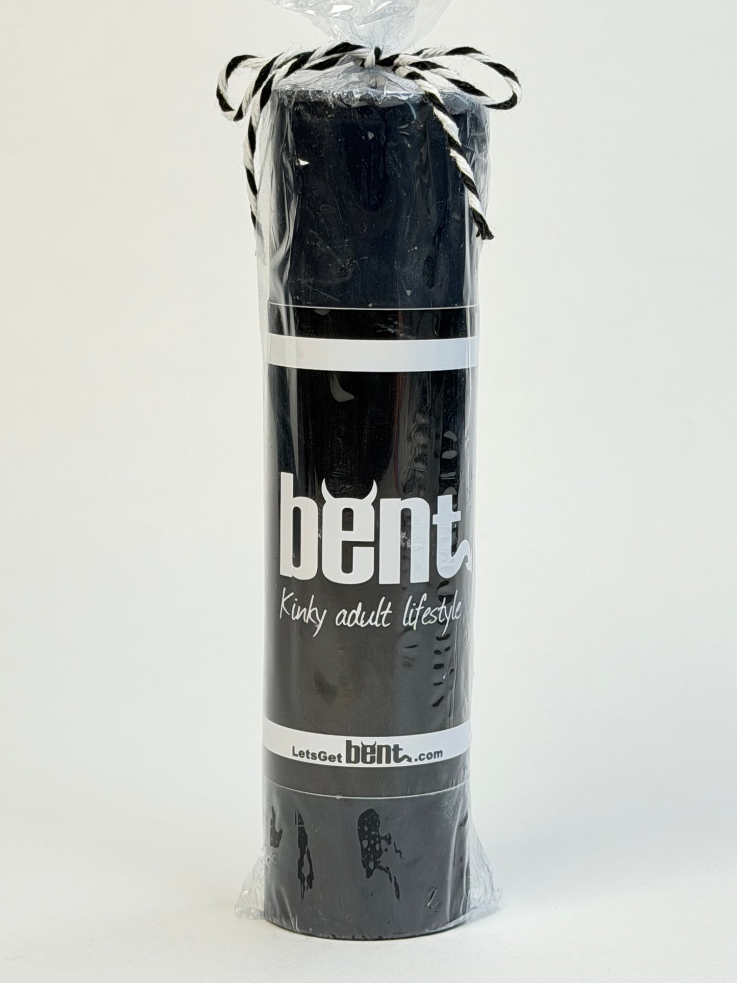 Handmade black paraffin wax play pillar candle by Bent