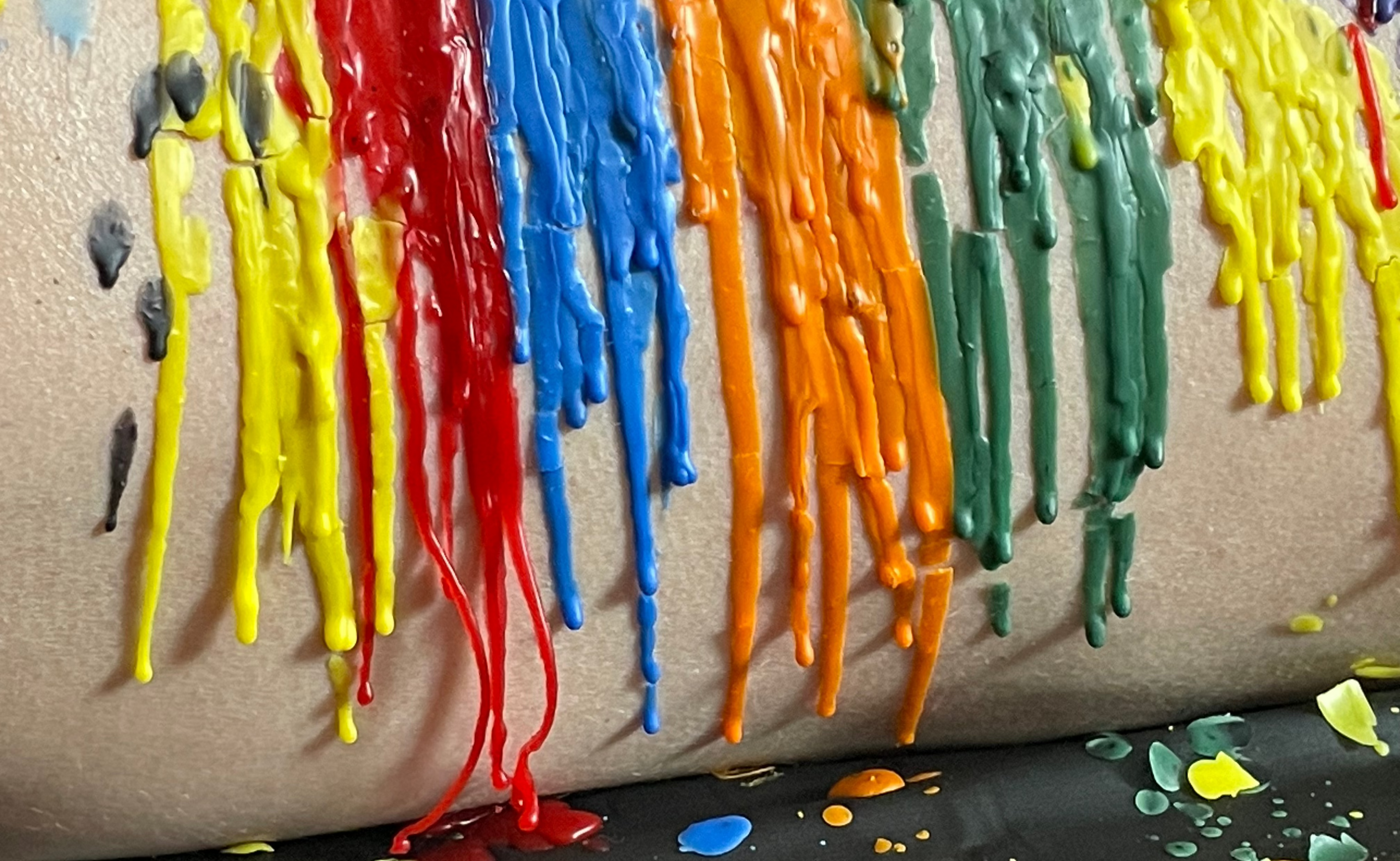 Bent low-temperature wax play candles in multiple colours