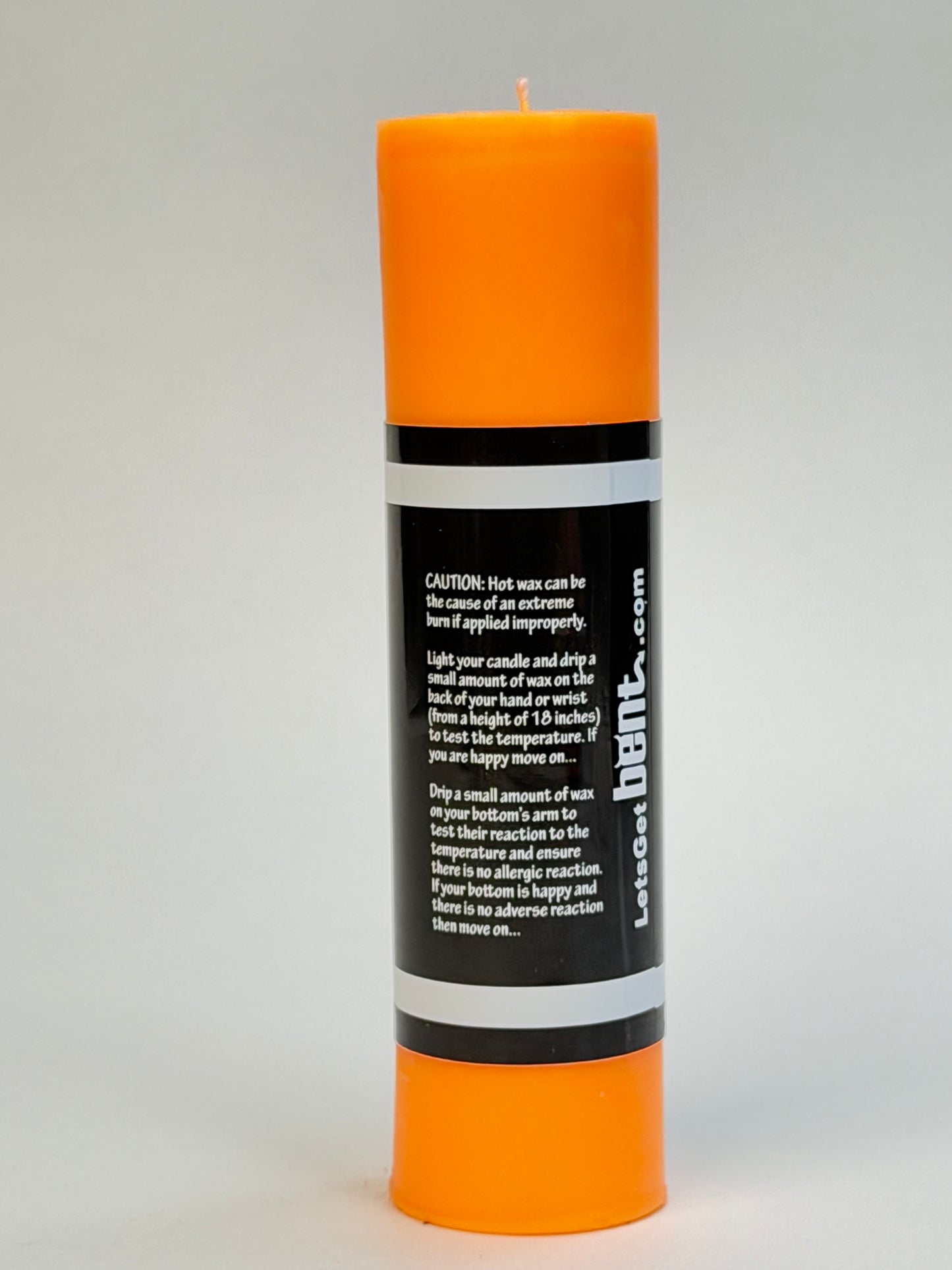 UV reactive orange wax play candle for sensory play