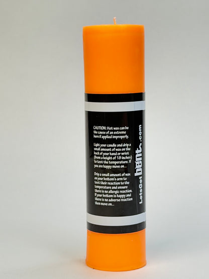 UV reactive orange wax play candle for sensory play