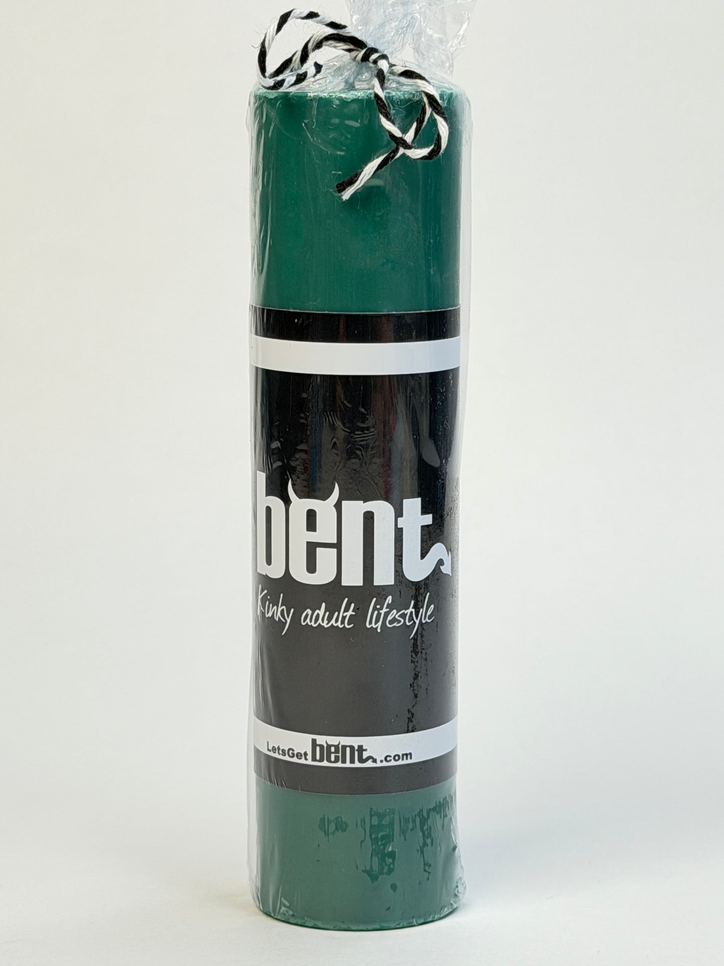 Handmade green paraffin wax play pillar candle by Bent in packaging