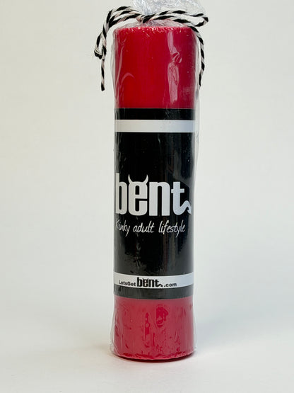 Handmade red paraffin wax play pillar candle by Bent in packaging