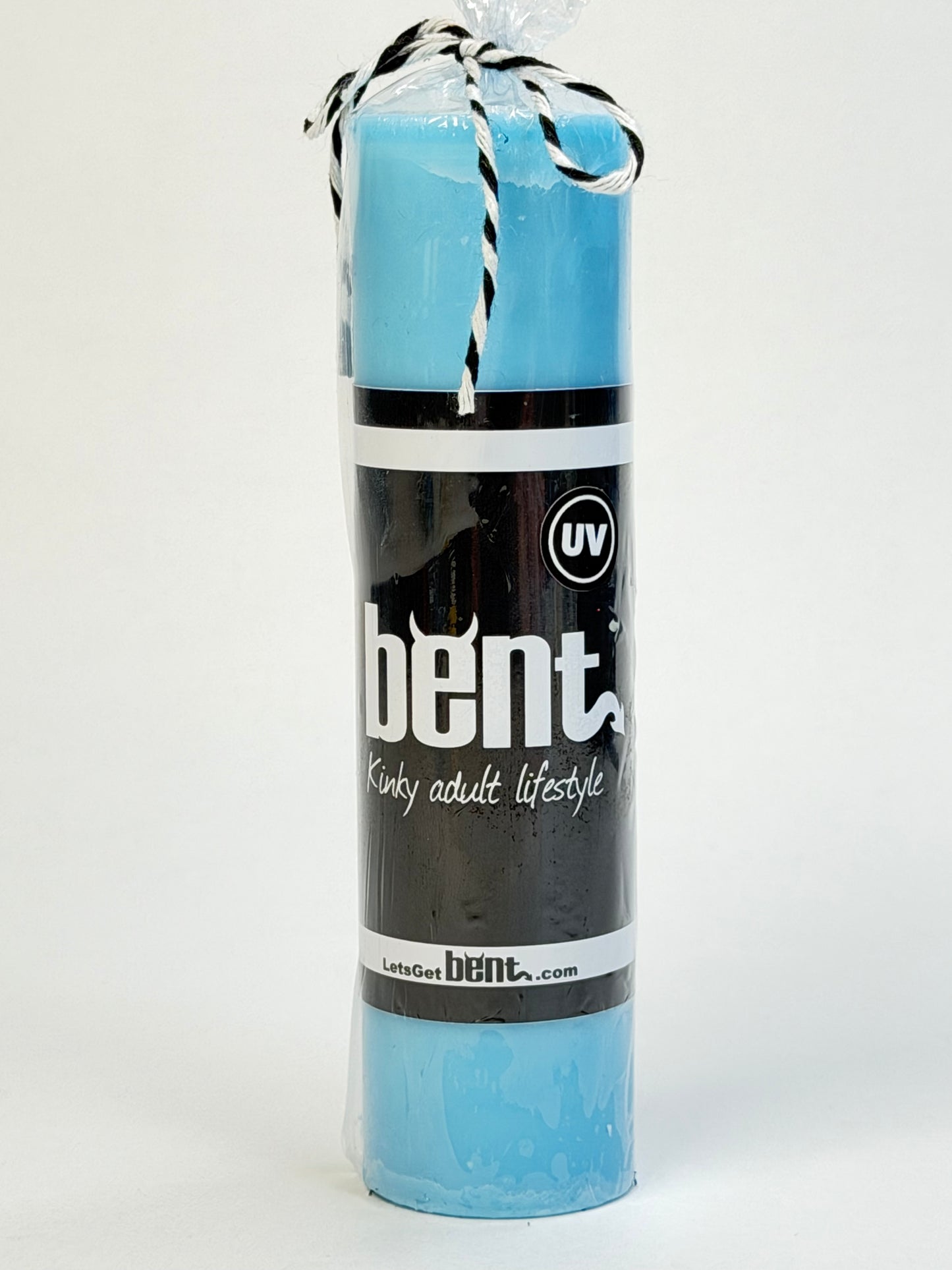 Handmade UV blue paraffin wax play pillar candle by Bent